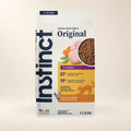 Instinct Original Chicken Kitten Food – 4.5 lb — authentic packaging on a cream background