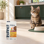 Instinct Original Chicken Kitten Food – 4.5 lb — packaging in a cream and forest-green mealtime scene
