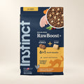 Instinct RawBoost Chicken Cat Food – 10 lb — authentic packaging on a cream background