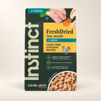 Instinct FreshDried Chicken Puppy Meals – 25 oz on a warm cream background