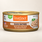 Instinct Duck Flaked Wet Cat Food – 12 × 5.5 oz on a cream background